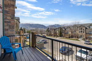Balcony with a mountain view and a residential view