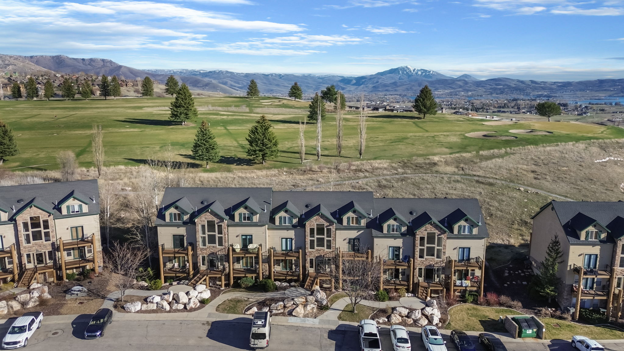 Aerial view of mountains and a golf club