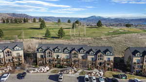 Aerial view of mountains and a golf club
