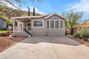 Manufactured / mobile home with crawl space and a patio area
