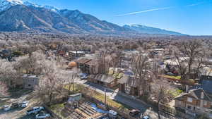 Aerial perspective of suburban area with a mountain backdrop