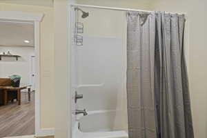 Full bathroom with shower / bath combination
