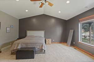 Primary Bedroom featuring light carpet, ceiling fan, and recessed lighting