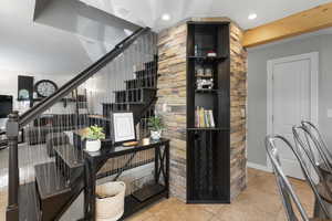 Stairs featuring tile patterned flooring