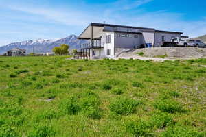 View of back property featuring a mountain view