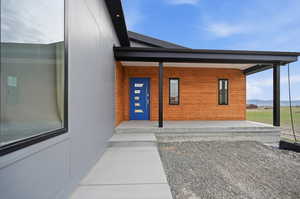 Front entrance featuring a porch