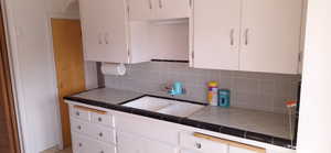 Tile countertop with two pull out cutting boards