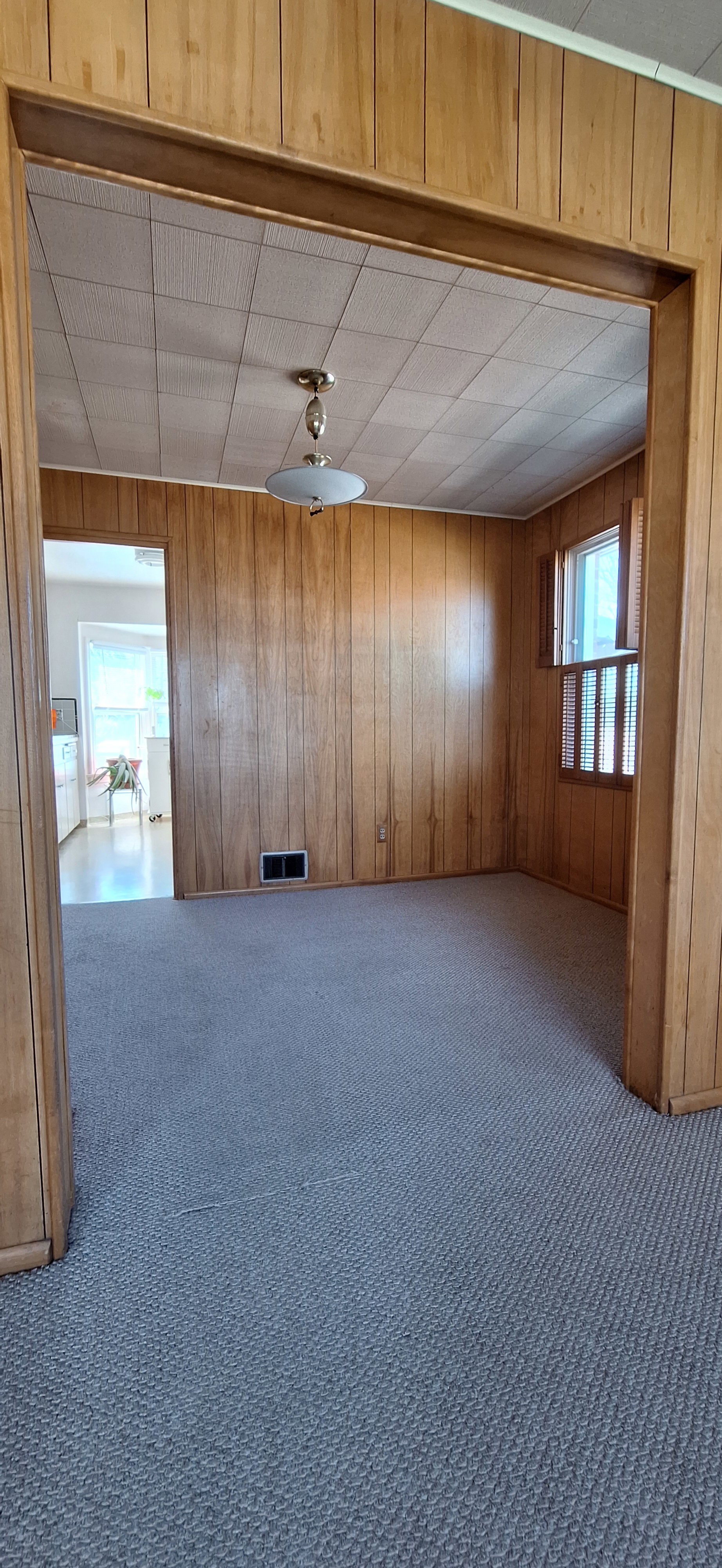 Dining room flows from living room to kitchen