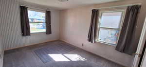Primary bedroom showing North and East windows