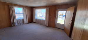 Large living room windows give open feel