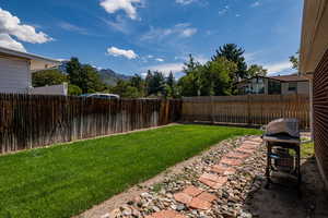 View of fenced backyard