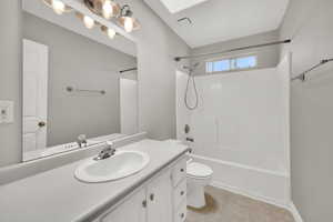 Full bathroom featuring vanity and shower / bathtub combination