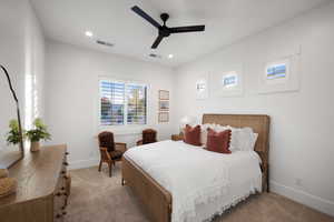Bedroom with a ceiling fan, carpet floors, and recessed lighting