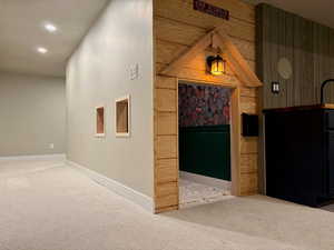 Hallway with carpet flooring and recessed lighting