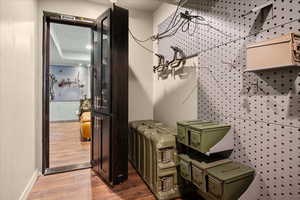 Detailed view of wood finished floors and baseboards