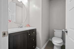Bathroom with vanity and toilet