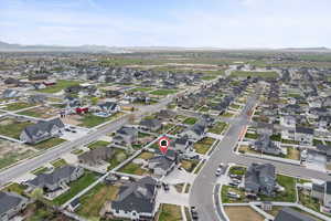 View of property location with nearby suburban area and a mountainous background