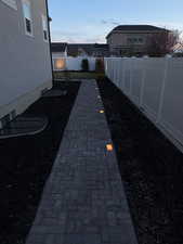 View of fenced backyard