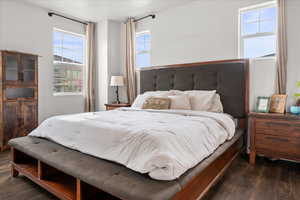 Bedroom featuring dark wood finished floors