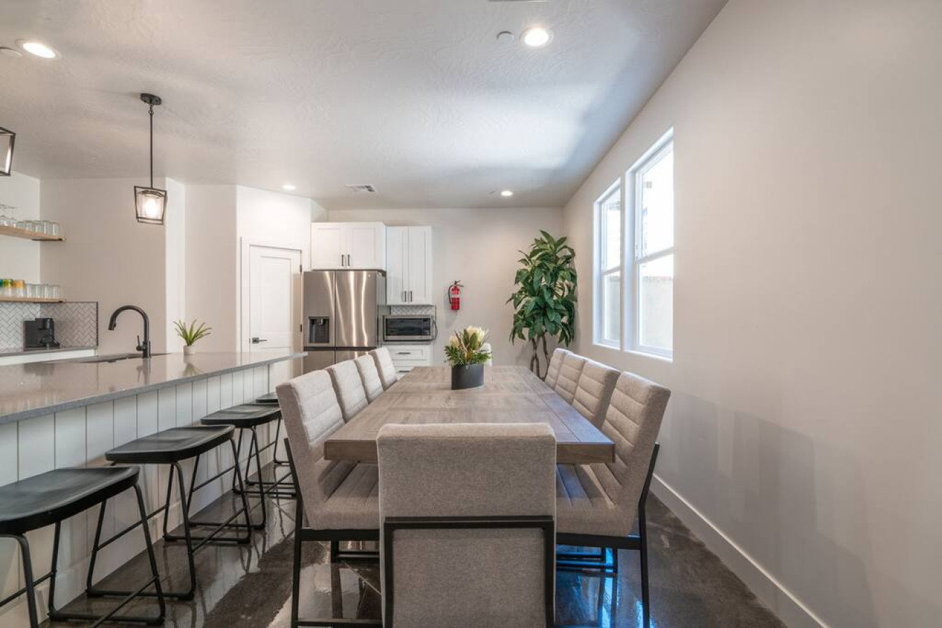 Dining area featuring baseboards and recessed lighting