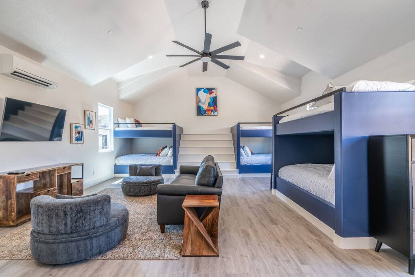 Bedroom with light wood-style flooring and ceiling fan