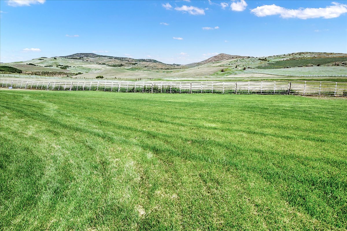 View of yard with a mountain view and a view of countryside