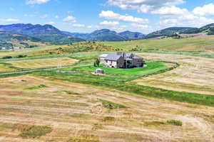 View of mountain background featuring rural landscape