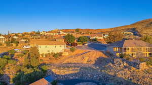 Aerial perspective of suburban area with a mountain backdrop