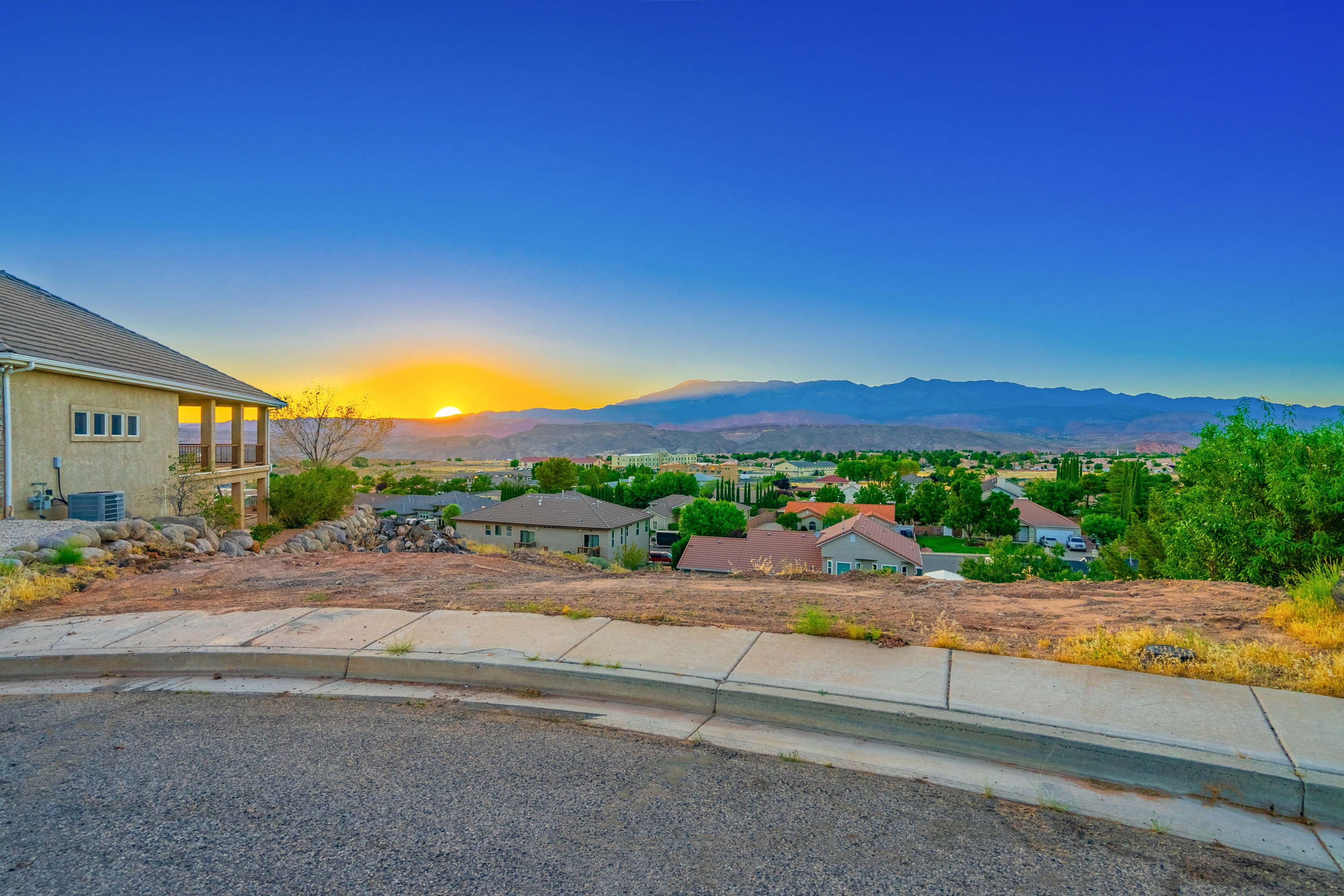 Mountain view featuring nearby suburban area
