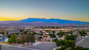 Mountain view featuring nearby suburban area