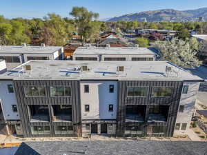 View of building exterior featuring a mountain view