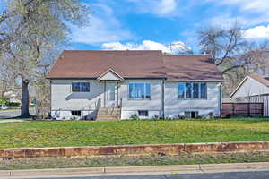 View of front of home with a front yard
