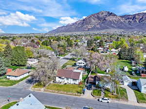 Aerial view of residential area featuring mountains