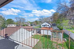 Balcony featuring a residential view