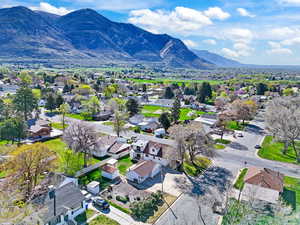 Aerial view of residential area featuring mountains