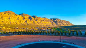 View of swimming pool with a mountain view