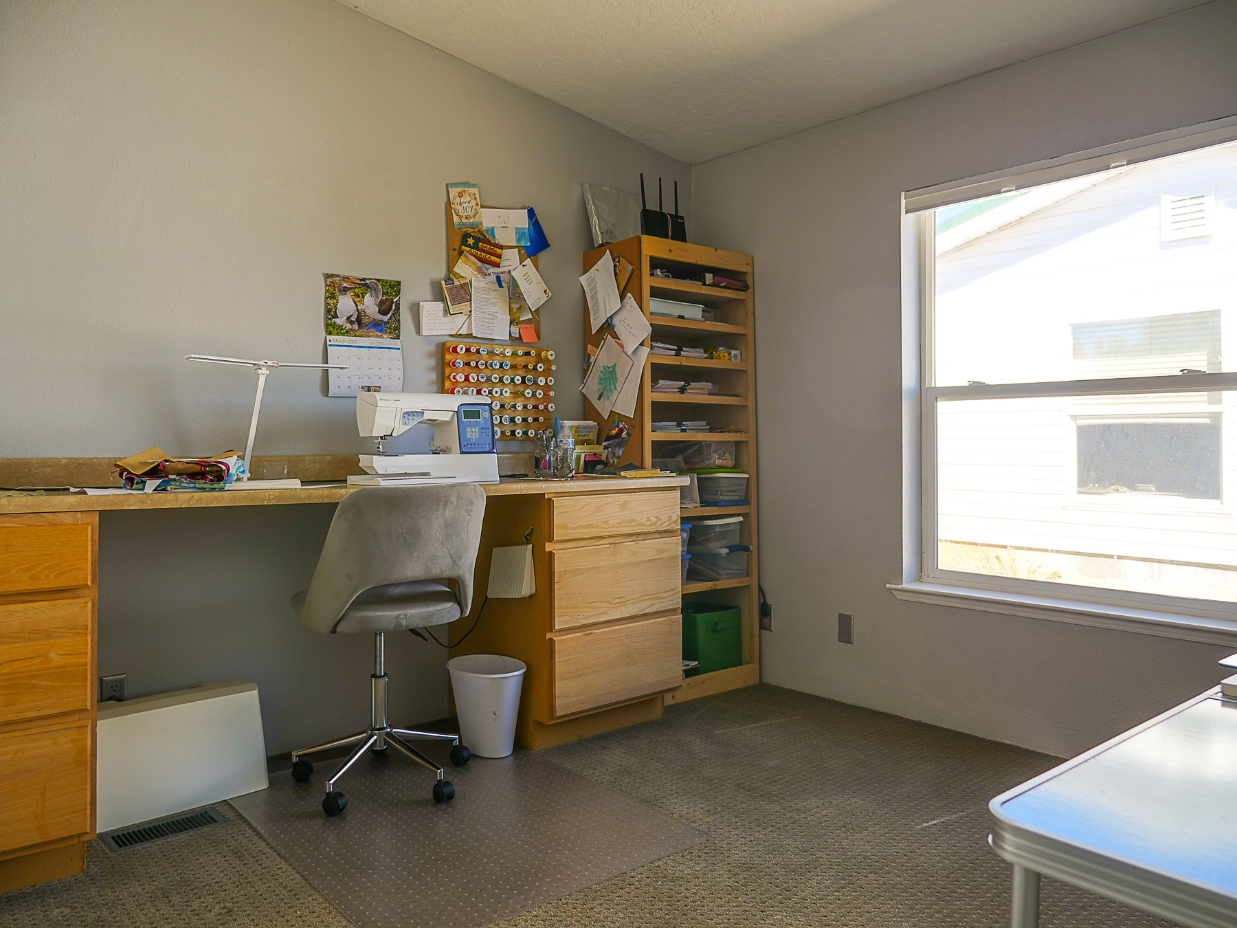 Home office featuring dark carpet