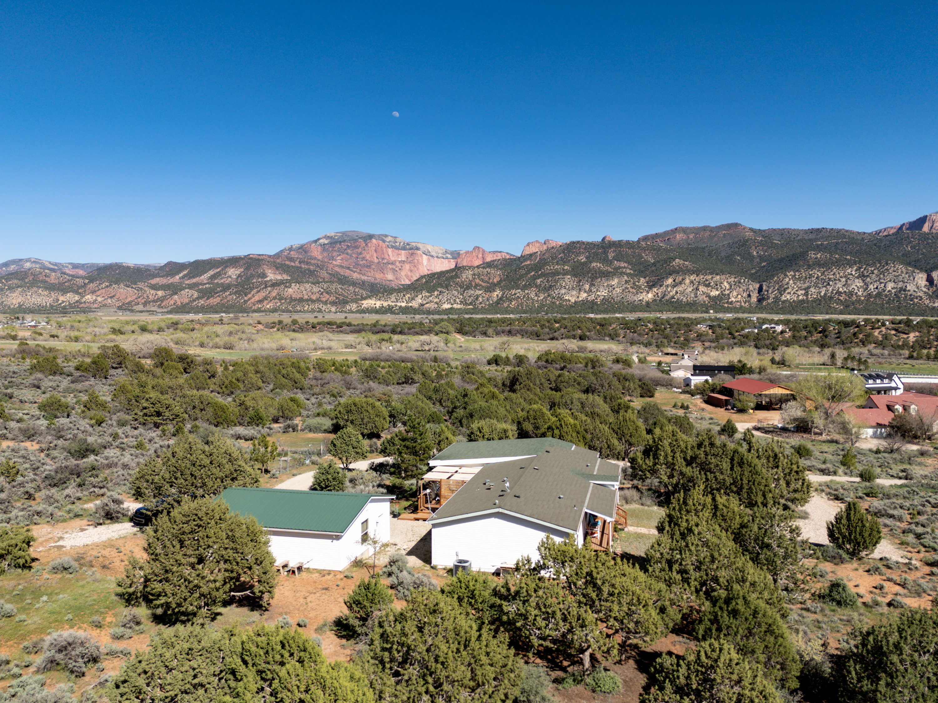 View from above of property featuring a mountainous background