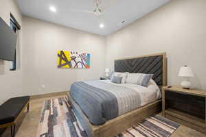 Bedroom with recessed lighting, ceiling fan, and tile patterned flooring