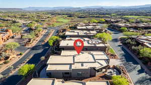 Aerial view of residential area featuring a mountain backdrop