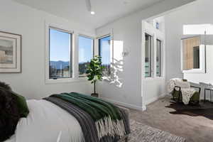 Carpeted bedroom featuring baseboards and recessed lighting
