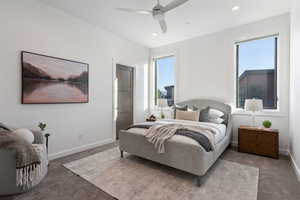 Bedroom featuring carpet flooring, ceiling fan, and recessed lighting