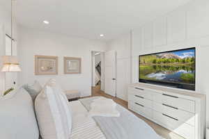 Bedroom featuring light wood finished floors and recessed lighting