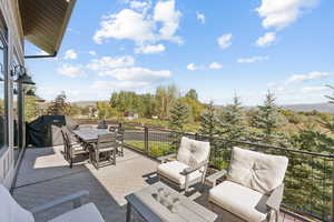 View of patio featuring grilling area and outdoor lounge area