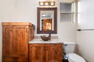 Bathroom with vanity and toilet