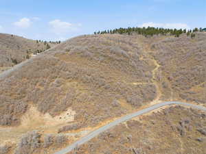 View of mountain backdrop featuring rural landscape