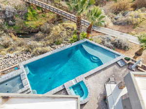 Swimming pool with a patio area