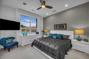 Bedroom featuring ceiling fan, carpet flooring, and recessed lighting