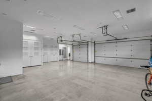 Garage featuring baseboards