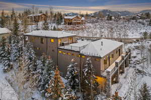 Snowy aerial view with a mountain view